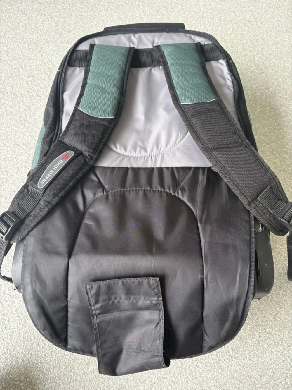 High Sierra Green Rolling Backpack/converts into carry on and regular backpack